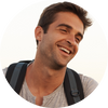 Hume fitness band 2.0 on wrist with early illness detection stats and customer testimonial